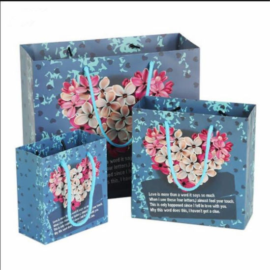 Hochwertiges blaues Papier Verpackungsbeutel Blume bedruckter Karton Geschenkbox Hochzeitsfeier Geburtstagsbevorzugung Geschenktüten