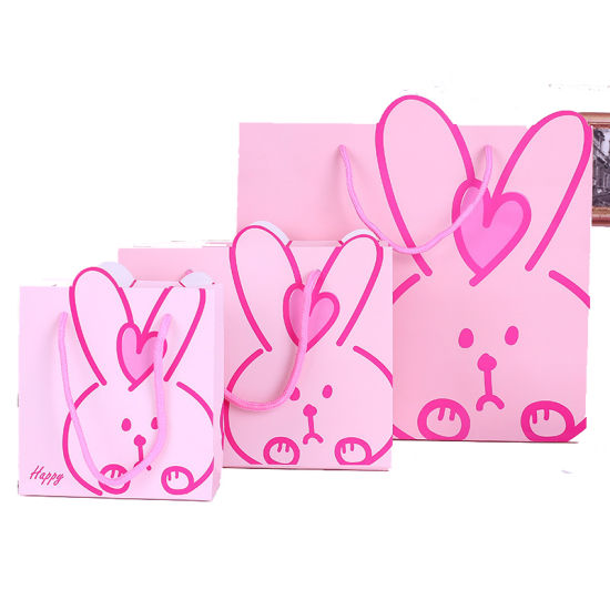 Venta al por mayor personalizada de la impresión de la bolsa de papel de la ropa del bebé del rosa del diseño lindo del conejo